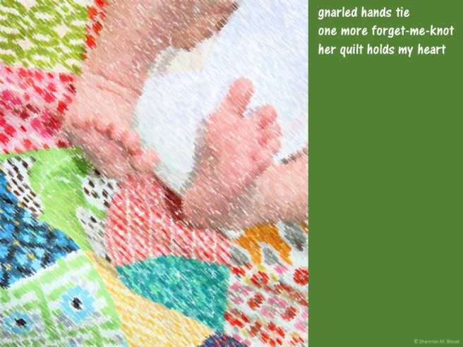 quilt with baby feet